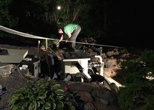 11:30 pm, working on the lower pond equipment